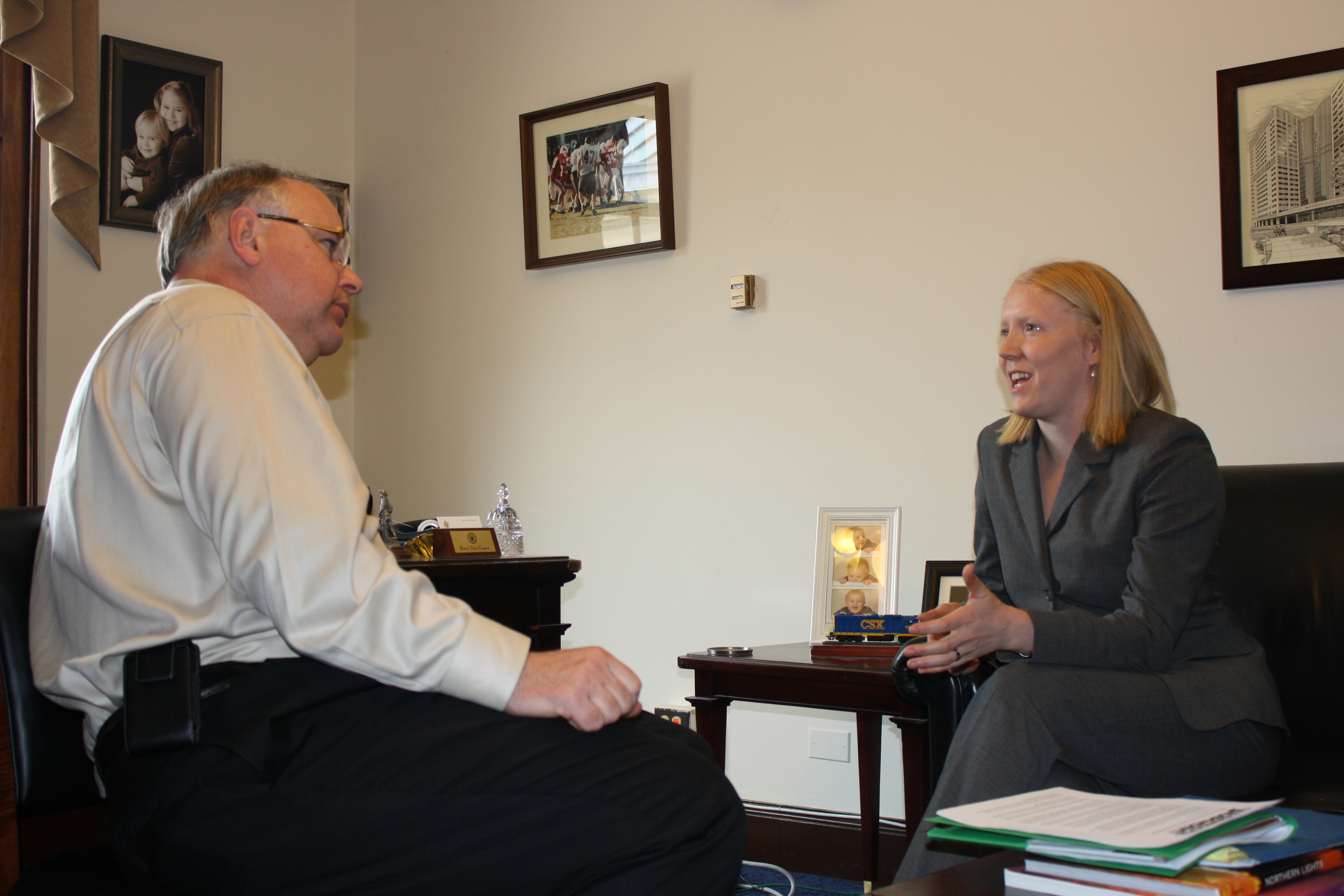 Sam Chadwick (at the time a staffer with Environment America) and then-Congressman Tim Walz discussing climate and clean water issues.