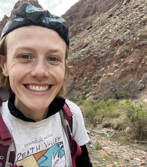 Ingrid Lyons with rock face behind her