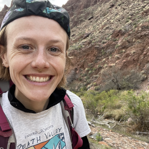 Ingrid Lyons with rock face behind her