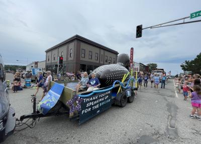 Float in front of state theater